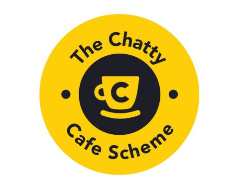 The Chatty Cafe scheme coffee cup in black and yellow circle